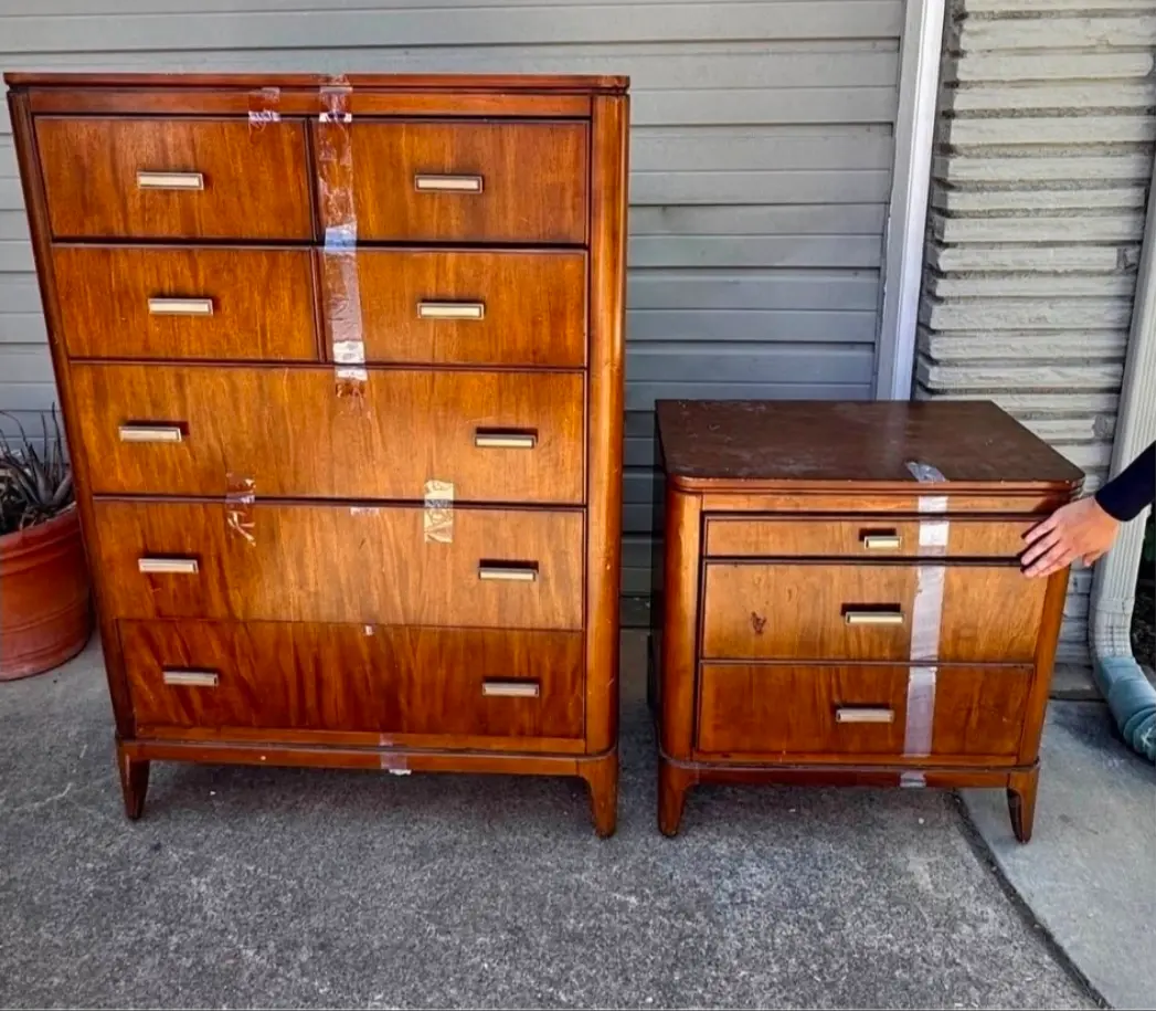 Matching bedroom tallboy and nightstand before restoration, original finish worn and taped for transport